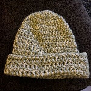 green and white knit beanie